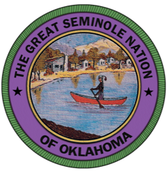 Circle logo of a painting. There is a person with a hat on rowing a boat in water near a town. 
&#xB0;THE GREAT SEMINOLE NATION*
